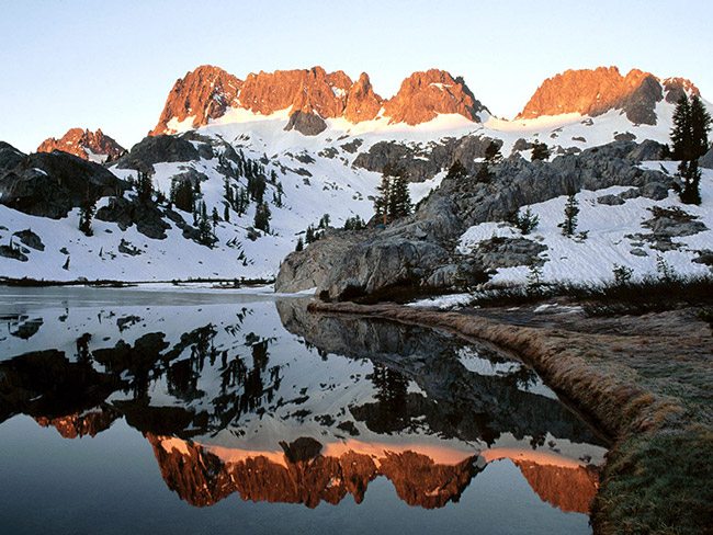 Minarets-reflected-in-Lake-Ediza,-Ansel-Adams