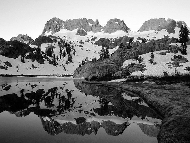 Minarets-reflected-in-Lake-Ediza,-Ansel-Adamsbw