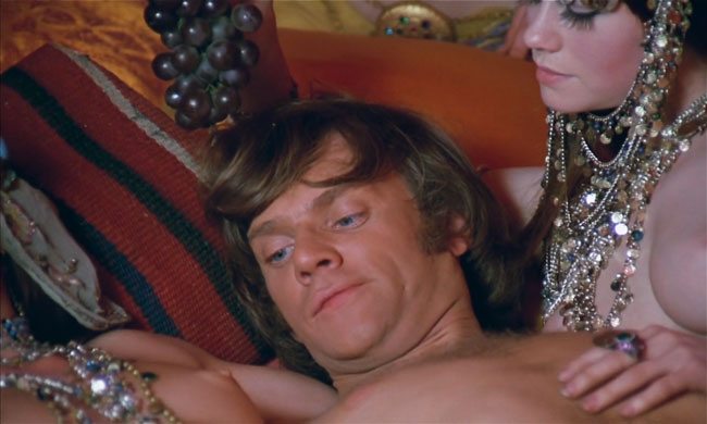 Clockwork-Orange-Eating-Grapes