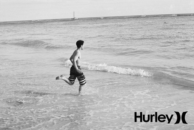 Mastering-composition-tavis-leaf-glover-running-boy-beach-hurley-logo